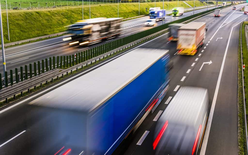 Lorry moving fast on road